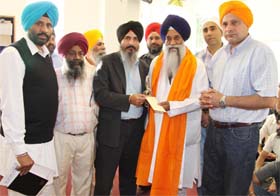 The Sikh community honouring Akal Takht Jathedar Giani Gurbachan Singh at Manchester in the UK last week