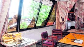 An office of Garhwal Mandal Vikas Nigam with broken windows after a storm hit Dehradun on Tuesday morning.