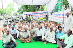 State government pensioners hold a protest at the Gandhi Park in Dehradun