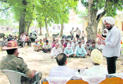 T.S.Tony, National Conference leader, addresses residents of Abdulian border village in the RS Pura sector in the Jammu region 