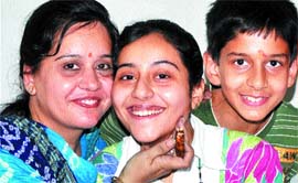 Rubina being greeted by their parents.