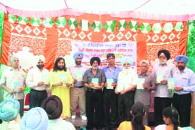Members of Punjabi Likhari Sabha at Rampur village in Khanna at a book release