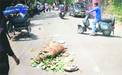Garbage littered on a road in Mussoorie
