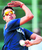 Indias Ashish Nehra bowls during a practice session in Dambulla on Wednesday
