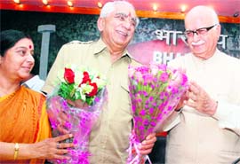 Lok Sabha MP, Jaswant Singh, being greeted by BJP leaders LK Advani and Sushma Swaraj as he rejoins the party in New Delhi on Thursday.