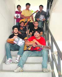 Michelangelo (red t-shirt) along with his team