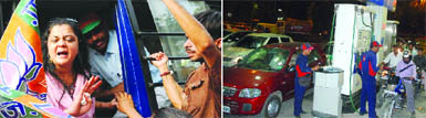 BJP activists protest against the hike. People queue up at a petrol pump to fill their vehicles before the hike comes into force at midnight.