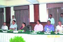 Union Minister of Women and Child Development Krishna Tirath chairs a meeting in Nainital on Friday.