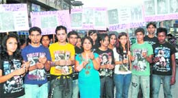 Fans of Michael Jackson take out a candle march in Dehradun on Friday