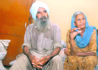 Amar Singh and his wife Naseeb Kaur. Tribune photo: Malkiat Singh