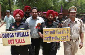 Cops taking out rally to mark the International Day against Drug Abuse in Bathinda on Saturday.