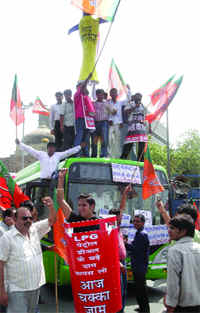 BJP activists shout anti-government slogans during the protest on Saturday.
