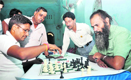 Participants at the Third Uttarakhand Open Chess Tournament in Dehradun on Saturday.