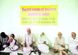 Senior social activists, including Sunderlal Bahuguna, Dr Anil Joshi, Vimla Bahuguna, at Shuklapur near Dehradun on Saturday