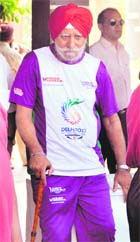 Veteran athlete Daljit Singh takes the support of a stick after participating in the Queens baton relay in PAU on Saturday. 