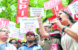 CPM leader Brinda Karat protests along with party workers