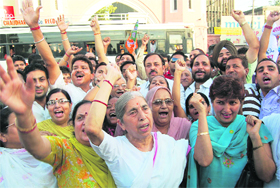 Leaders and activists of the BJP led by Health Minister Laxmi Kanta Chawla raise slogans against the Congress-led UPA government over price rise in Amritsar on Saturday