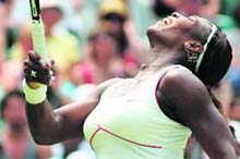 US Serena Williams reacts during her match against Slovakias Dominika Cibulkova during the Wimbledon Championships in London on Saturday.