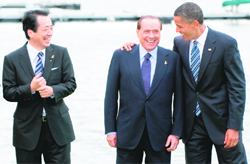 Japanese PM Naoto Kan (left), US President Barack Obama and Italian PM Silvio Berlusconi during the G8 Summit at Muskoka in Canada