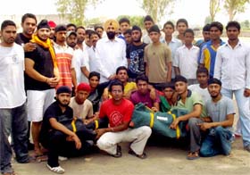 Parminder Singh, General Secretary, PPCC, with the youths, who have been taken as members of cricket teams on Sunday