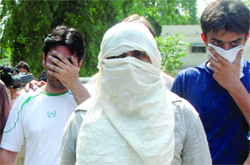 Muder accused Anil and his accomplices Nitin and Vikash are produced at Patiala Court in New Delhi on Sunday.
