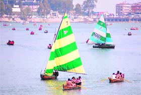 People enjoy boating in the Nainital Lake
