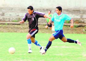 Players in action at the Lala Nemi Dass Dehradun Football League in Dehradun