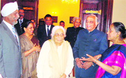 Governor Margaret Alva talks to parliamentarians in Nainital on Friday.