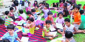 Chilldren take part in a painting competition at the Kamla Nehru Park in Gurgoan on Saturday.