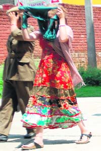 Foreigners arrested by the police being led to the Kangra SP office at Dharamsala