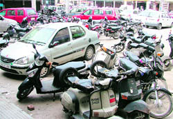 Haphazardly parked vehicles and two-wheelers at Bhadaur House in Ludhiana 