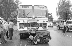 The mangled remains of the scooter that was crushed under a Haryana roadways bus on the Zirakpur-Patiala highway 