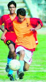 A match in progress at the Promotional Football Tournament in Dehradun on Monday