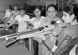 Girls practising at the Badal shooting range 