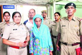Kiran Devi being produced in a local court at Rohtak