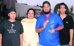 Gurjap (second from right) with his family in Karnal.