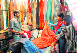 People buying clothes at the National Handloom Expo-2010 in Shimla