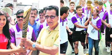 Minister for Sports R.S. Chib carries the Queens Baton at Kaluchak in Jammu on Monday.The Baton arrived here from Lakhanpur in Kathua district from Punjab.; and (right) players carry the Baton during the relay run