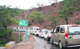 Vehicles caught in a traffic jam on the Jammu-Katra road near Domain