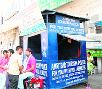 A kiosk of the Amritsar Tourism Police near the Golden Temple complex in Amritsar.