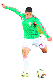 Mexicos striker Javier Hernandez prepares to score against Argentina during their match in Soweto on Sunday.