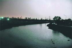 Lightning and an overcast sky lend a surreal backdrop in Ludhiana on Tuesday morning