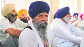Sikh pilgrims attend a prayer session inside the compound of Maharaja Ranjit Singh's mausoleum in Lahore. Hundreds of Sikh pilgrims attended the ceremonies to commemorate 171th death anniversary of Maharaja Ranjit Singh