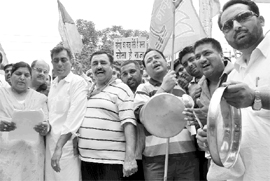 BJP activists protest against hike in fuel prices, in Mohali on Wednesday