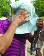 Amarjeet Singh, arrested for allegedly raping a Brazilian woman, being produced in Patiala House Court in New Delhi