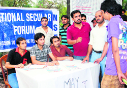 Members of the NSF guide students seeking admission to various postgraduate courses at Jammu University on Wednesday. 