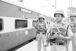 Security personnel search platforms for explosive during a 48-hour strike called by Maoists at Hatia Railway station in Ranchi on Wednesday.