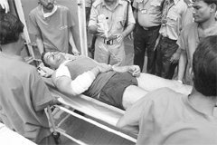 A cop, injured in a blast carried out by Naxals, being rushed to a hospital in Ranchi. 