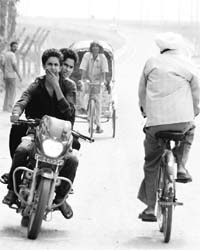 Commuters without helmets near the Zirakpur flyover