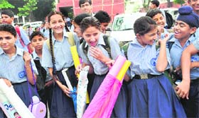 BACK TO BUSINESS: Students of Government Model Senior Secondary School, Sector 16, Chandigarh, at their school after the summer vacations